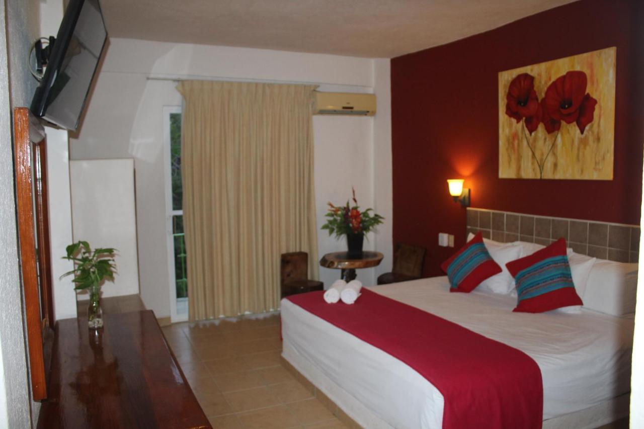Hotel Arenas Del Pacifico ซานตา ครูซ ฮัวทุลโก ภายนอก รูปภาพ