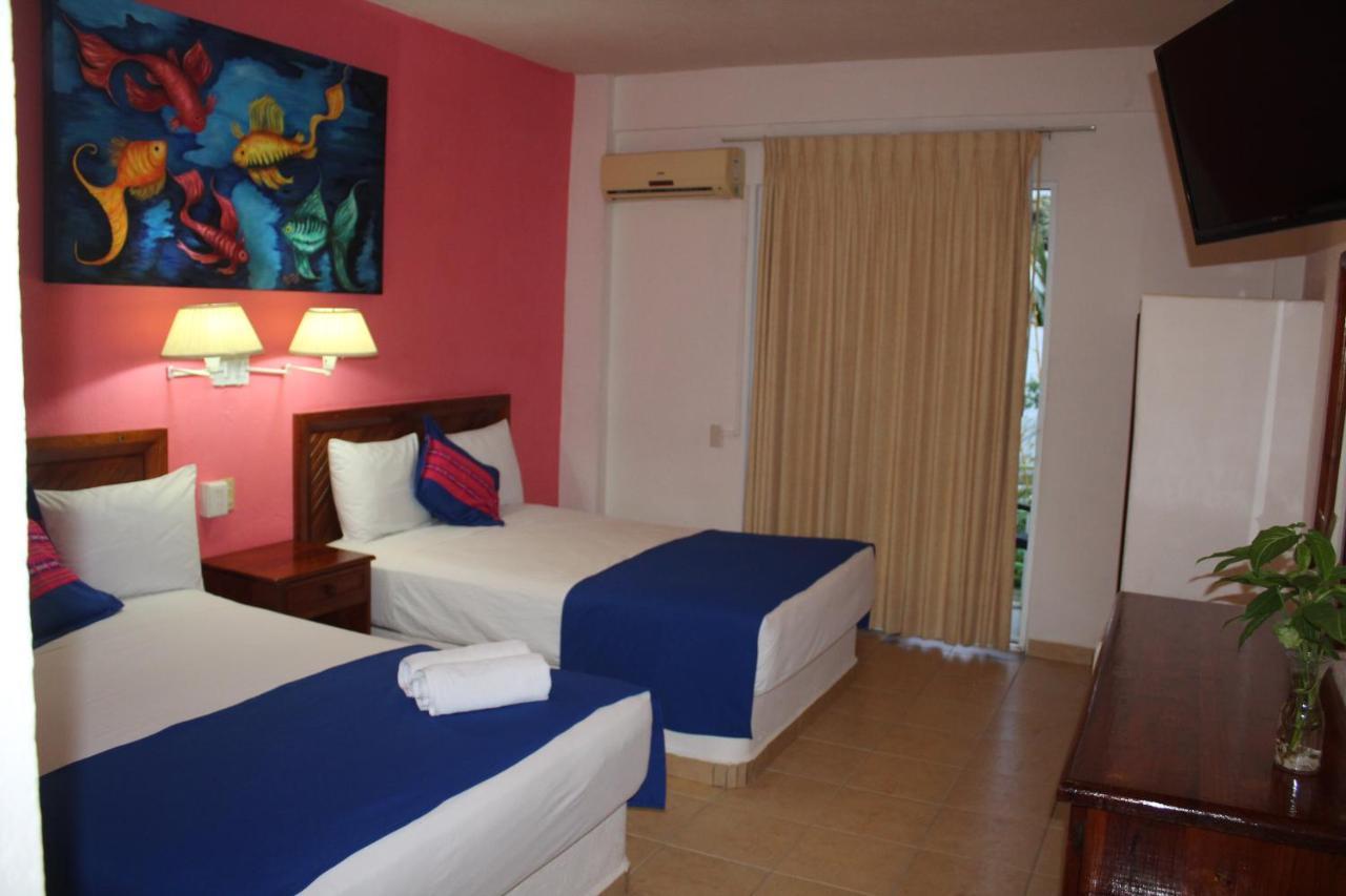 Hotel Arenas Del Pacifico ซานตา ครูซ ฮัวทุลโก ภายนอก รูปภาพ