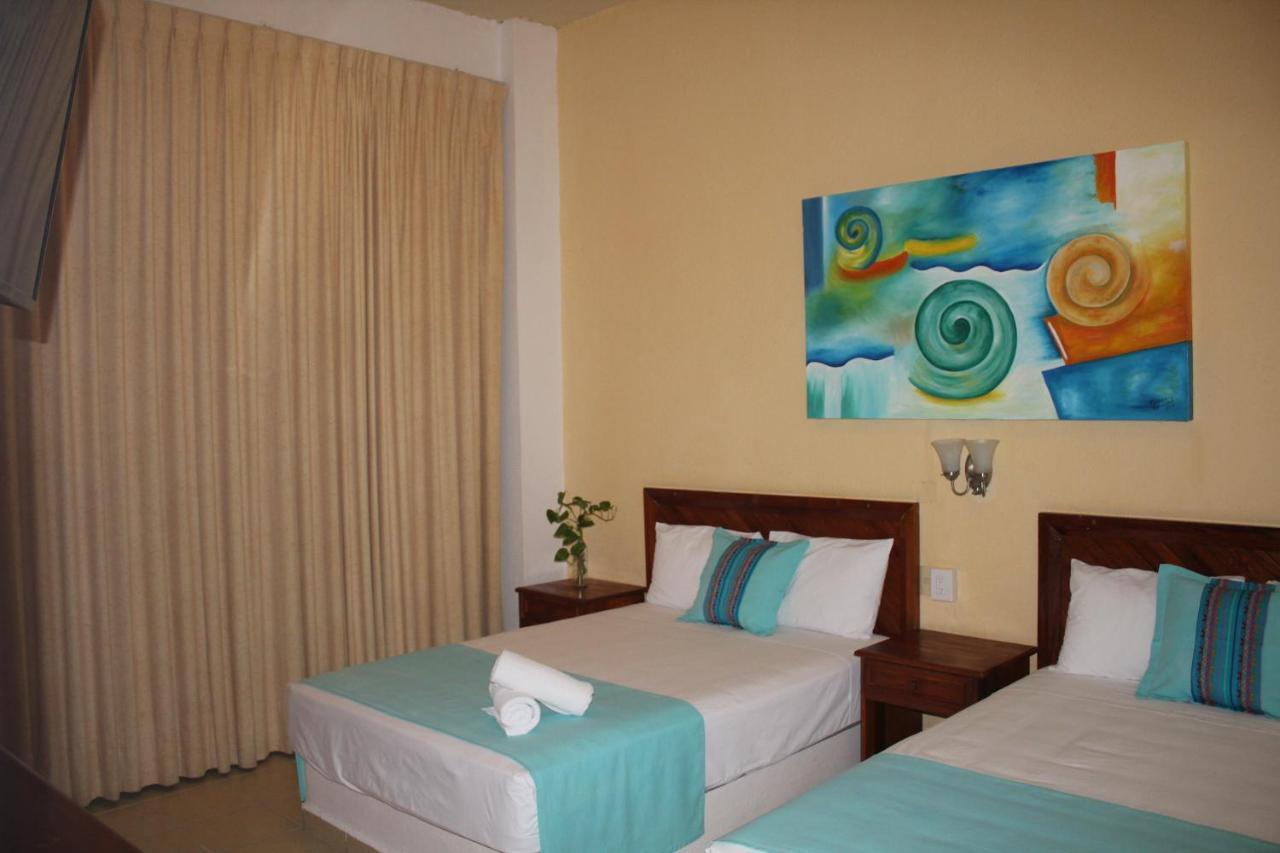 Hotel Arenas Del Pacifico ซานตา ครูซ ฮัวทุลโก ภายนอก รูปภาพ