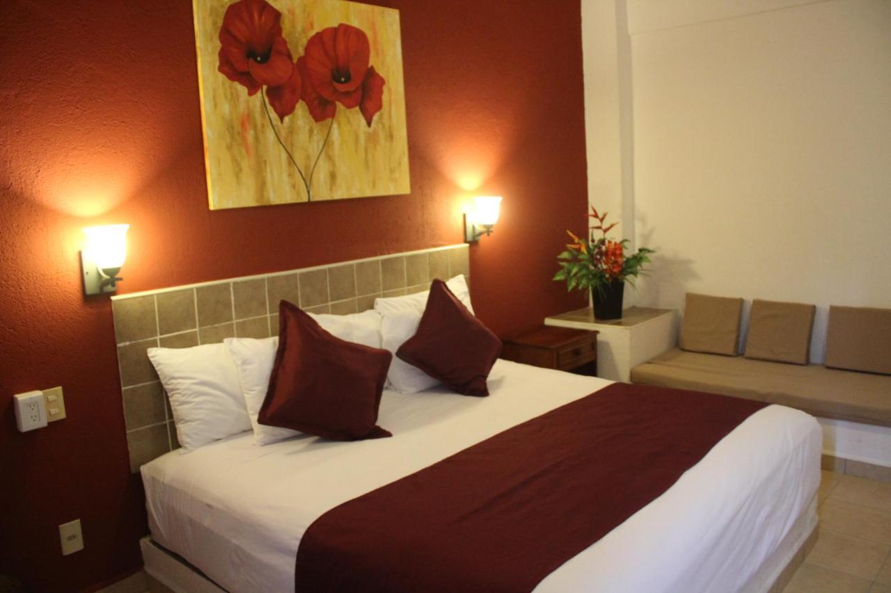 Hotel Arenas Del Pacifico ซานตา ครูซ ฮัวทุลโก ภายนอก รูปภาพ