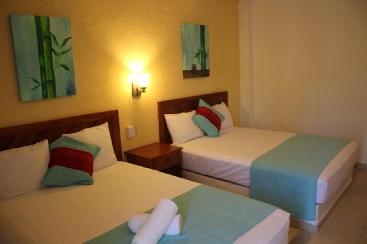 Hotel Arenas Del Pacifico ซานตา ครูซ ฮัวทุลโก ภายนอก รูปภาพ