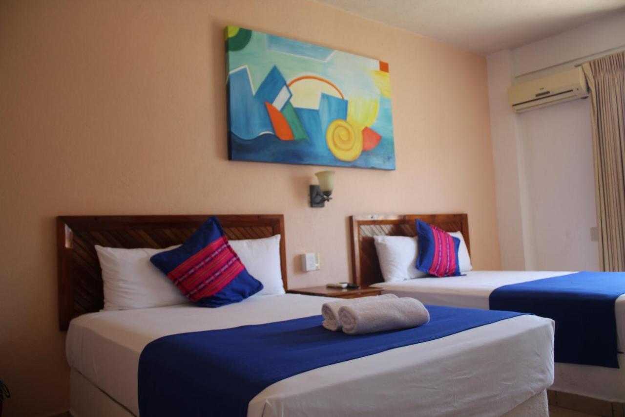 Hotel Arenas Del Pacifico ซานตา ครูซ ฮัวทุลโก ภายนอก รูปภาพ