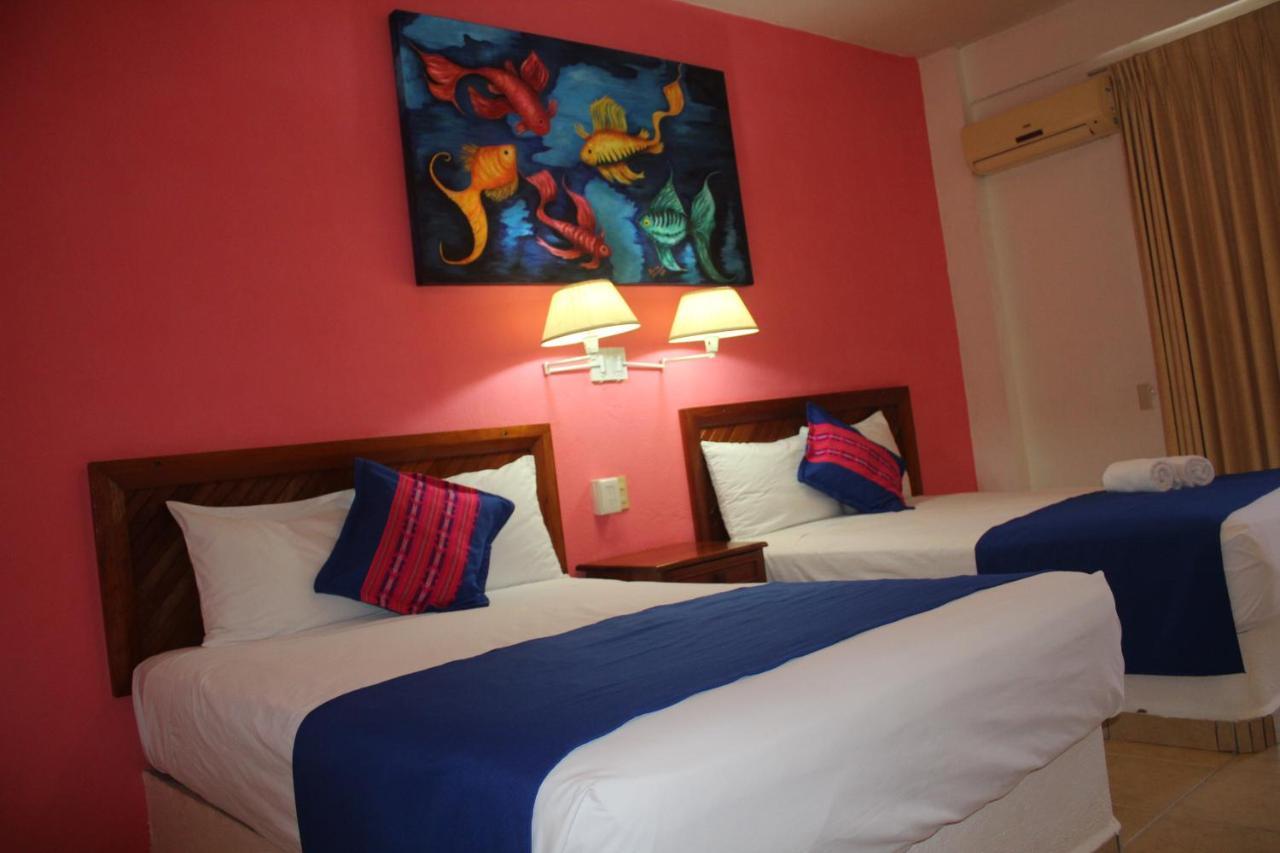 Hotel Arenas Del Pacifico ซานตา ครูซ ฮัวทุลโก ภายนอก รูปภาพ