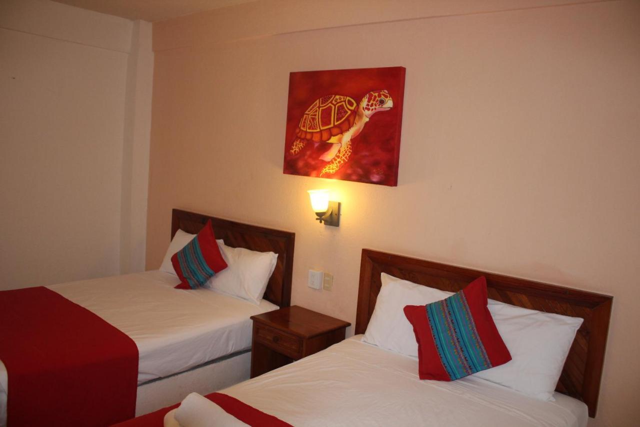 Hotel Arenas Del Pacifico ซานตา ครูซ ฮัวทุลโก ภายนอก รูปภาพ