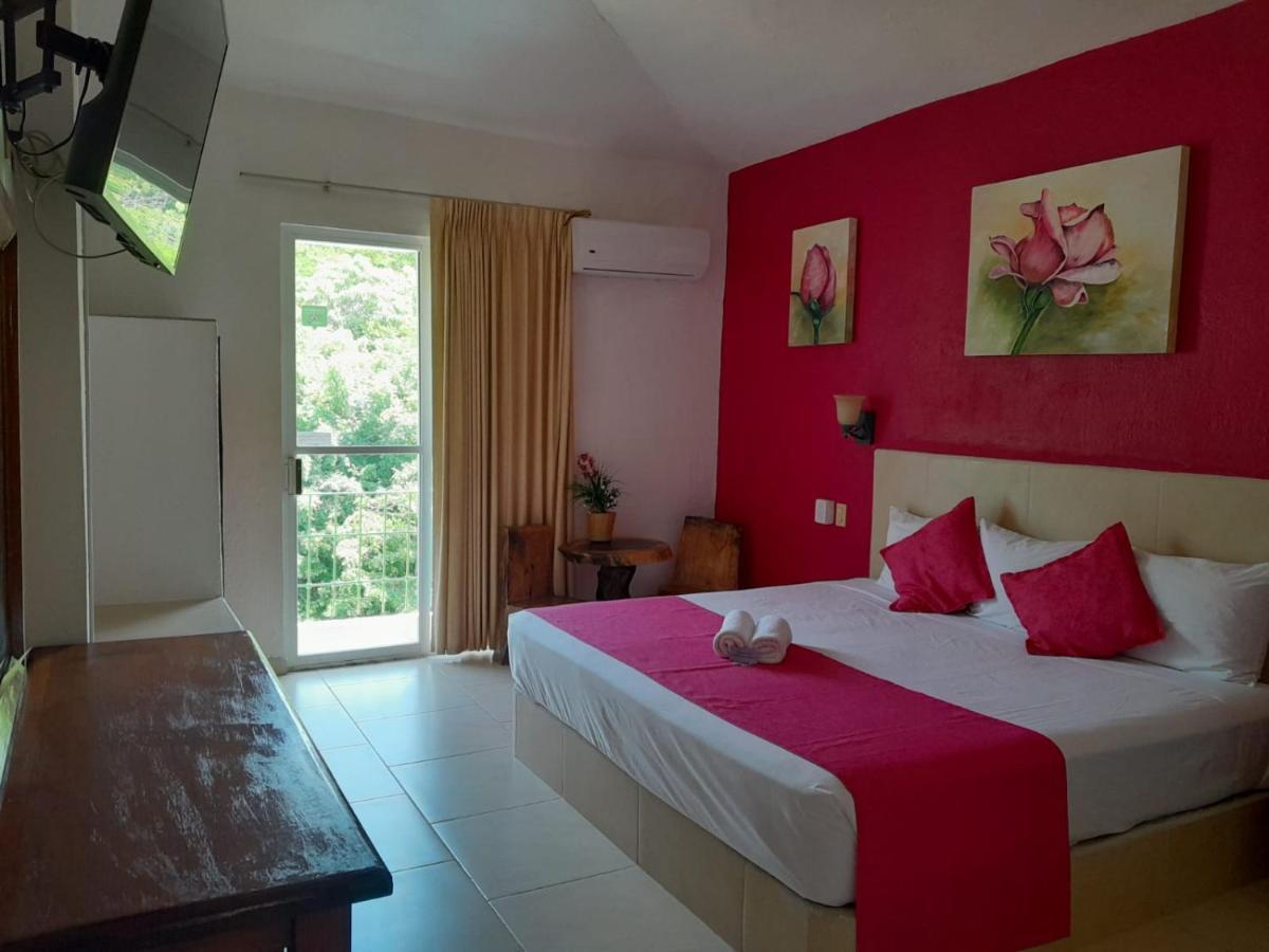 Hotel Arenas Del Pacifico ซานตา ครูซ ฮัวทุลโก ภายนอก รูปภาพ