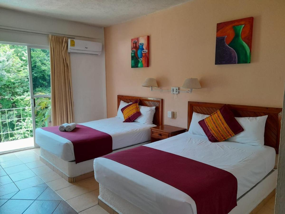 Hotel Arenas Del Pacifico ซานตา ครูซ ฮัวทุลโก ภายนอก รูปภาพ
