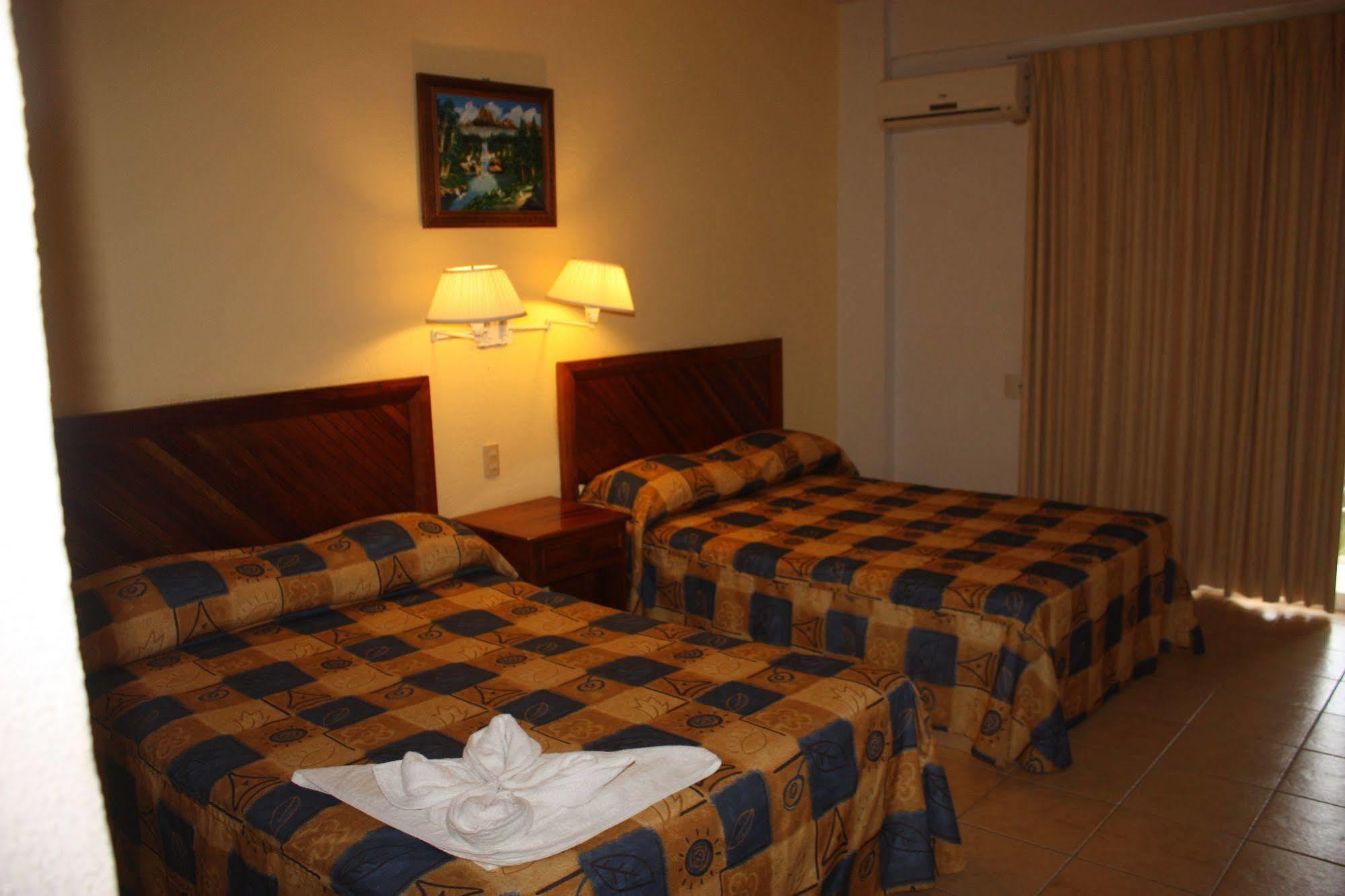 Hotel Arenas Del Pacifico ซานตา ครูซ ฮัวทุลโก ภายนอก รูปภาพ