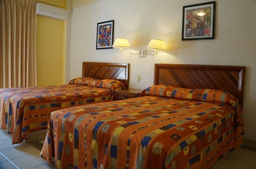 Hotel Arenas Del Pacifico ซานตา ครูซ ฮัวทุลโก ภายนอก รูปภาพ