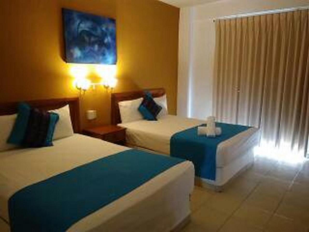 Hotel Arenas Del Pacifico ซานตา ครูซ ฮัวทุลโก ภายนอก รูปภาพ